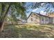 Backyard featuring lush green lawn and view of the rear of the house at 2001 S Main St, Kannapolis, NC 28081