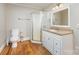 Bathroom with updated vanity, frosted glass shower and wood floor at 2001 S Main St, Kannapolis, NC 28081