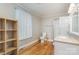 Bright bathroom featuring a glass shower, toilet, sink, and cabinet storage at 2001 S Main St, Kannapolis, NC 28081