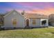 Charming single-story home featuring a cozy front porch, traditional windows and a well-maintained lawn at 2001 S Main St, Kannapolis, NC 28081