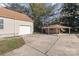 Detached garage and carport with concrete driveway at 2001 S Main St, Kannapolis, NC 28081