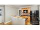 Cozy kitchen with wood cabinets, black appliances, and granite countertops at 2001 S Main St, Kannapolis, NC 28081