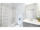 Bathroom with a shower-tub, grey vanity, neutral paint and a toilet with plant accents at 221 Mountain Island Dr, Statesville, NC 28677