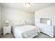 Bedroom with a queen bed, white dressers, neutral paint and carpet, and natural light at 221 Mountain Island Dr, Statesville, NC 28677