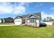 Charming single Gathering home with well maintained lawn and two car garage at 221 Mountain Island Dr, Statesville, NC 28677