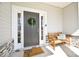 Cozy front porch featuring a bench and welcome mat at 221 Mountain Island Dr, Statesville, NC 28677