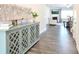 Entry hall with hardwood floors and decorative furniture at 221 Mountain Island Dr, Statesville, NC 28677