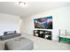Open living space with a sectional sofa and a large TV and furniture at 221 Mountain Island Dr, Statesville, NC 28677