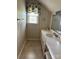 Charming bathroom featuring a marble vanity, stylish sink and updated fixtures, creating a relaxing and inviting space at 2417 Lynwood Dr, Lancaster, SC 29720