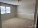 Comfortable bedroom with carpet flooring, neutral walls, and a bright window, ideal for relaxation at 2417 Lynwood Dr, Lancaster, SC 29720