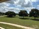 Picturesque front yard with lush green grass, mature trees and a white fence, perfect for outdoor enjoyment at 2417 Lynwood Dr, Lancaster, SC 29720