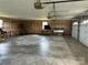 Spacious garage with wood paneled walls and natural light at 2417 Lynwood Dr, Lancaster, SC 29720