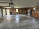 Large garage with cabinets and door to the outside at 2417 Lynwood Dr, Lancaster, SC 29720