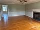 Spacious living room featuring hardwood floors, fireplace, and neutral paint at 2417 Lynwood Dr, Lancaster, SC 29720