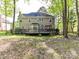 Large deck, spacious backyard with ample space for outdoor activities and entertaining at 2805 Bathgate Ln, Matthews, NC 28105