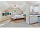A carpeted bedroom with a tv, bed, and small kitchen area at 2805 Bathgate Ln, Matthews, NC 28105