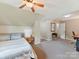 Spacious bedroom with neutral tones and carpet, offering a comfortable and inviting atmosphere at 2805 Bathgate Ln, Matthews, NC 28105