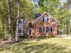 Charming brick home featuring a well-manicured lawn, bay window, and black shutters at 2805 Bathgate Ln, Matthews, NC 28105