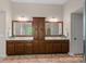 Bathroom features a double sink vanity with a tower cabinet, and tiled floor at 3060 Drummond Ave, Indian Land, SC 29707