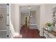 Inviting foyer boasts hardwood floors and staircase leading to the second floor of the home at 3060 Drummond Ave, Indian Land, SC 29707