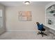 Bright office features a built-in bookcase and desk, and a large window at 3060 Drummond Ave, Indian Land, SC 29707