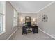 Bright home office with a modern desk setup and ample natural light at 3060 Drummond Ave, Indian Land, SC 29707
