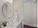 Contemporary powder room features a stylish mirror and a vessel sink at 3060 Drummond Ave, Indian Land, SC 29707