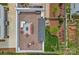 Aerial view of a modern home featuring a spacious rooftop deck, backyard, and well-maintained landscaping at 310 Wesley Heights Way, Charlotte, NC 28208
