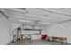 Spacious garage with ample storage, featuring bright lighting, and a clean, organized layout at 310 Wesley Heights Way, Charlotte, NC 28208
