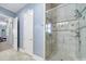 Bright bathroom with a glass-enclosed shower, tiled walls, and modern fixtures at 374 Horton Grove Rd, Fort Mill, SC 29715