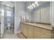 Bathroom with a granite countertop vanity, updated light fixtures, and neutral walls at 374 Horton Grove Rd, Fort Mill, SC 29715
