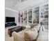 Relaxing bonus room features built-in bookshelves, comfortable seating, and media center at 374 Horton Grove Rd, Fort Mill, SC 29715