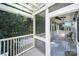 Spacious screened-in porch with backyard views, ceiling fan, and comfortable outdoor seating at 374 Horton Grove Rd, Fort Mill, SC 29715