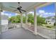 Outdoor porch with stylish pillars overlooking the neighborhood trees and street at 374 Horton Grove Rd, Fort Mill, SC 29715