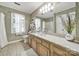 Bathroom with an undermount sink and a large mirror at 4 Hummingbird Ct, Clover, SC 29710