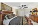 Bedroom featuring carpet, a dark wooden bed frame, and bright natural lighting at 4 Hummingbird Ct, Clover, SC 29710