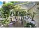 Undercover deck with a wooden table and chairs perfect for relaxing outdoors at 4 Hummingbird Ct, Clover, SC 29710