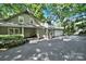 Charming home exterior features a well-maintained yard, attached garage and inviting covered porch at 4 Hummingbird Ct, Clover, SC 29710