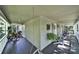 Inviting covered front porch with ample seating and serene views, perfect for relaxing outdoors at 4 Hummingbird Ct, Clover, SC 29710