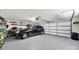 Spacious garage with a black car at 4 Hummingbird Ct, Clover, SC 29710
