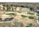 Picturesque aerial view of the golf course with lush green fairways and water features at 4 Hummingbird Ct, Clover, SC 29710