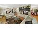 Cozy living room showcasing a fireplace, hardwood floors, and an open layout for entertaining guests at 4 Hummingbird Ct, Clover, SC 29710