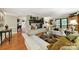 Spacious living room featuring a large fireplace, hardwood floors, and ample natural light at 4 Hummingbird Ct, Clover, SC 29710