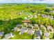 Aerial view of a neighborhood featuring lush green landscaping and beautiful homes at 405 Five Leaf Ln, Waxhaw, NC 28173