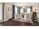 Cozy living room with neutral paint colors, comfortable seating, and ample natural light at 405 Five Leaf Ln, Waxhaw, NC 28173