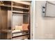 Organized walk-in closet with custom shelving, drawers, and ample storage space at 435 S Tryon St, Charlotte, NC 28202