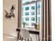 Bright home office with modern desk setup, city views, and elegant decor at 435 S Tryon St, Charlotte, NC 28202