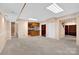 Spacious basement with carpet, kitchen, bathroom, and storage or safe room at 4405 3Rd Nw St, Hickory, NC 28601