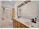 Well-lit bathroom with double vanity, ample counter space and tub shower, a comfortable space at 4405 3Rd Nw St, Hickory, NC 28601