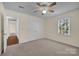 Bedroom with closet, ceiling fan, and natural light from the window at 4405 3Rd Nw St, Hickory, NC 28601